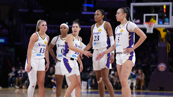 May 27, 2025; Los Angeles, California, USA; LA Sparks guard Sarah Ashlee Barker (13), guard Odyssey Sims (0), guard Kelsey Plum (10), forward Azura Stevens (23) and forward Dearica Hamby (5) react in the second half against the Atlanta Dream at Crypto.com Arena. Mandatory Credit: Kirby Lee-Imagn Images