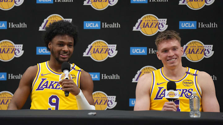 Sep 30, 2024; El Segundo, CA, USA; Los Angeles Lakers guard Bronny James (9) and forward Dalton Knecht (4) during media day at the UCLA Health Training Center. Mandatory Credit: Kirby Lee-Imagn Images