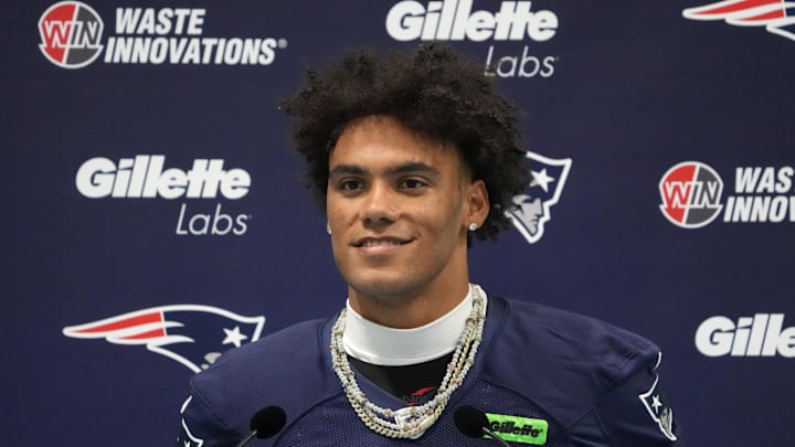 Oct 18, 2024; London, United Kingdom; New England Patriots cornerback Christian Gonzalez (0) at press conference at the Harrow School. Mandatory Credit: Kirby Lee-Imagn Images