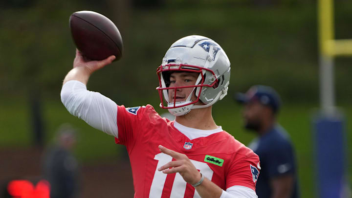 Oct 18, 2024; London, United Kingdom; New England Patriots quarterback Drake Maye (10) throws the ball during practice at the Harrow School. Mandatory Credit: Kirby Lee-Imagn Images