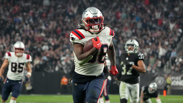Dec 18, 2022; Paradise, Nevada, USA; New England Patriots running back Rhamondre Stevenson (38) scores on a 34-yard touchdown run in the second half against the Las Vegas Raiders at Allegiant Stadium. The Raiders defeated the Patriots 30-24. Mandatory Credit: Kirby Lee-Imagn Images