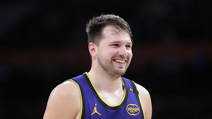Mar 17, 2025; Los Angeles, California, USA; Los Angeles Lakers guard Luka Doncic (77) reacts against the San Antonio Spurs in the first half at Crypto.com Arena. Mandatory Credit: Kirby Lee-Imagn Images Mar 17, 2025; Los Angeles, California, USA; Los Angeles Lakers guard Luka Doncic (77) reacts against the San Antonio Spurs in the first half at Crypto.com Arena. Mandatory Credit: Kirby Lee-Imagn Images