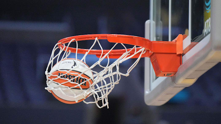 Aug 15, 2024; Los Angeles, California, USA; A WNBA official Wilson Evo NXT basketball approaches the rim and net at Crypto.com Arena. Mandatory Credit: Kirby Lee-Imagn Images Aug 15, 2024; Los Angeles, California, USA; A WNBA official Wilson Evo NXT basketball approaches the rim and net at Crypto.com Arena. Mandatory Credit: Kirby Lee-Imagn Images