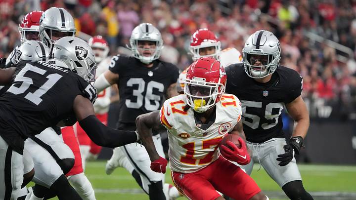 Nov 26, 2023; Paradise, Nevada, USA; Kansas City Chiefs wide receiver Richie James (17) carries the ball against Las Vegas Raiders defensive end Malcolm Koonce (51) and linebacker Luke Masterson (59) in the first half at Allegiant Stadium. Mandatory Credit: Kirby Lee-USA TODAY Sports Nov 26, 2023; Paradise, Nevada, USA; Kansas City Chiefs wide receiver Richie James (17) carries the ball against Las Vegas Raiders defensive end Malcolm Koonce (51) and linebacker Luke Masterson (59) in the first half at Allegiant Stadium. Mandatory Credit: Kirby Lee-USA TODAY Sports