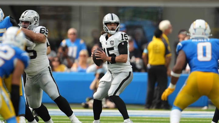 Sep 8, 2024; Inglewood, California, USA; Las Vegas Raiders quarterback Gardner Minshew (15) throws the ball against the Los Angeles Chargers in the second half at SoFi Stadium. Mandatory Credit: Kirby Lee-Imagn Images