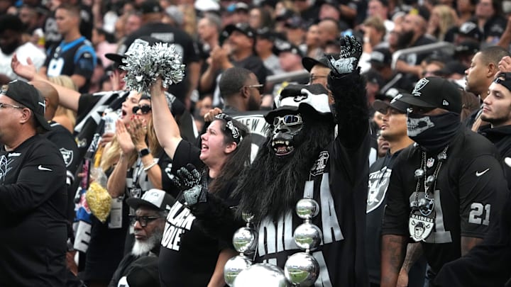 Sep 22, 2024; Paradise, Nevada, USA; Las Vegas Raiders fans Mark Acasio aka Gorilla Rilla and Marilyn Acasio aka Jungle Jane react during the game against the Carolina Panthers Allegiant Stadium. Mandatory Credit: Kirby Lee-Imagn Images