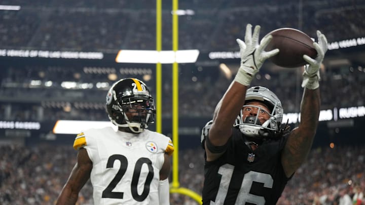 Sep 24, 2023; Paradise, Nevada, USA; Las Vegas Raiders wide receiver Jakobi Meyers (16) attempts to catch the ball against Pittsburgh Steelers cornerback Patrick Peterson (20) at Allegiant Stadium. Mandatory Credit: Kirby Lee-Imagn Images Sep 24, 2023; Paradise, Nevada, USA; Las Vegas Raiders wide receiver Jakobi Meyers (16) attempts to catch the ball against Pittsburgh Steelers cornerback Patrick Peterson (20) at Allegiant Stadium. Mandatory Credit: Kirby Lee-Imagn Images