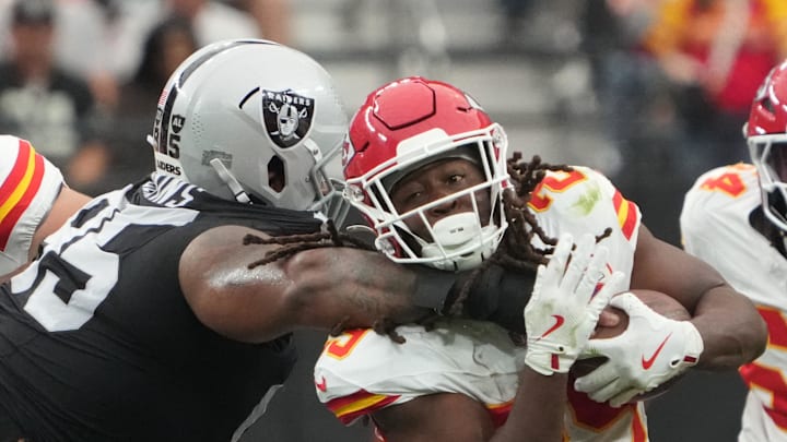 Oct 27, 2024; Paradise, Nevada, USA; Kansas City Chiefs running back Clyde Edwards-Helaire (25) is tackled by Las Vegas Raiders defensive tackle John Jenkins (95) in the first half at Allegiant Stadium. Mandatory Credit: Kirby Lee-Imagn Images Oct 27, 2024; Paradise, Nevada, USA; Kansas City Chiefs running back Clyde Edwards-Helaire (25) is tackled by Las Vegas Raiders defensive tackle John Jenkins (95) in the first half at Allegiant Stadium. Mandatory Credit: Kirby Lee-Imagn Images