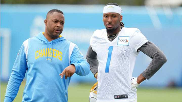 May 12, 2023; Costa Mesa, CA, USA; Los Angeles Chargers receiver Quentin Johnston (1) and receivers coach Chris Beatty during rookie minicamp at Hoag Performance Center. Mandatory Credit: Kirby Lee-Imagn Images May 12, 2023; Costa Mesa, CA, USA; Los Angeles Chargers receiver Quentin Johnston (1) and receivers coach Chris Beatty during rookie minicamp at Hoag Performance Center. Mandatory Credit: Kirby Lee-Imagn Images