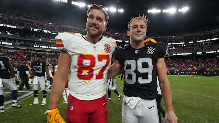 Oct 27, 2024; Paradise, Nevada, USA; Kansas City Chiefs tight end Travis Kelce (87) and Las Vegas Raiders tight end Brock Bowers (89) pose after the game at Allegiant Stadium. Mandatory Credit: Kirby Lee-Imagn Images