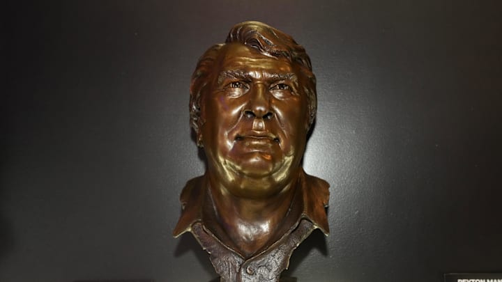 Feb 9, 2024; Las Vegas, NV, USA; The bust of Oakland Raiders coach John Madden at the Pro Football Hall of Fame exhibit at the NFL Experience at the Mandalay Bay South Convention Center. Mandatory Credit: Kirby Lee-Imagn Images