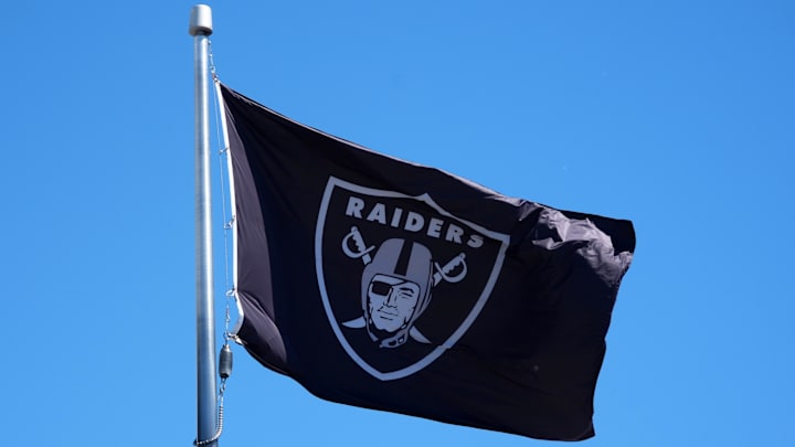 Jul 24, 2025; Henderson, NV, USA; A Las Vegas Raiders shield logo flag at the Intermountain Healthcare Performance Center. Mandatory Credit: Kirby Lee-Imagn Images