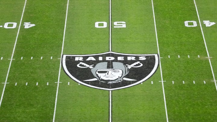 Dec 16, 2024; Paradise, Nevada, USA; The Las Vegas Raiders shield logo at midfield at Allegiant Stadium. Mandatory Credit: Kirby Lee-Imagn Images Dec 16, 2024; Paradise, Nevada, USA; The Las Vegas Raiders shield logo at midfield at Allegiant Stadium. Mandatory Credit: Kirby Lee-Imagn Images