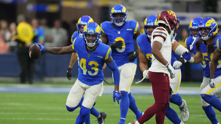Dec 17, 2023; Inglewood, California, USA; Los Angeles Rams safety John Johnson III (43) celebrates after intercepting a pass against the Washington Commanders in the second half at SoFi Stadium. Mandatory Credit: Kirby Lee-USA TODAY Sports Dec 17, 2023; Inglewood, California, USA; Los Angeles Rams safety John Johnson III (43) celebrates after intercepting a pass against the Washington Commanders in the second half at SoFi Stadium. Mandatory Credit: Kirby Lee-USA TODAY Sports
