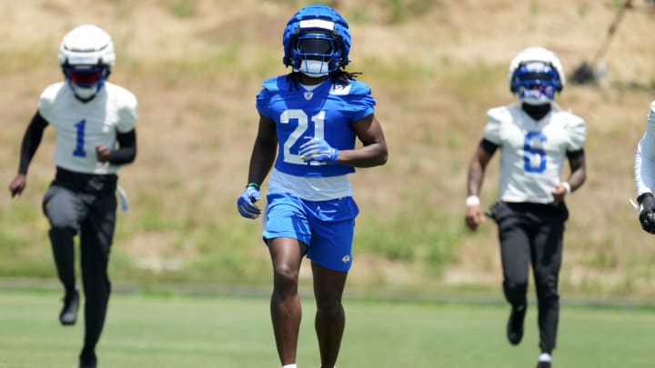 May 21, 2024, Thousand Oaks, California, USA; Los Angeles Rams running back Zach Evans (21) wears aa Guardian helmet cap during organized team activities at Cal Lutheran University. Mandatory Credit: Kirby Lee-USA TODAY Sports