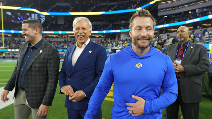 Dec 3, 2023; Inglewood, California, USA; Los Angeles Rams coach Sean McVaye (left) interacts with vice president of football operations Tony Pastoors (left) and owner Stan Kroenke (center) after the game against the Cleveland Browns at SoFi Stadium. Mandatory Credit: Kirby Lee-Imagn Images Dec 3, 2023; Inglewood, California, USA; Los Angeles Rams coach Sean McVaye (left) interacts with vice president of football operations Tony Pastoors (left) and owner Stan Kroenke (center) after the game against the Cleveland Browns at SoFi Stadium. Mandatory Credit: Kirby Lee-Imagn Images