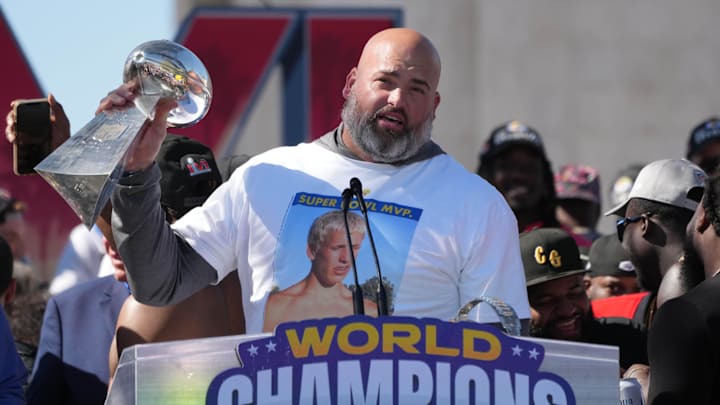 Feb 16, 2022; Los Angeles, CA, USA; Los Angeles Rams tackle Andrew Whitworth holds the Vince Lombardi trophy during the Super Bowl LVI championship rally at the Los Angeles Memorial Coliseum. Mandatory Credit: Kirby Lee-Imagn Images