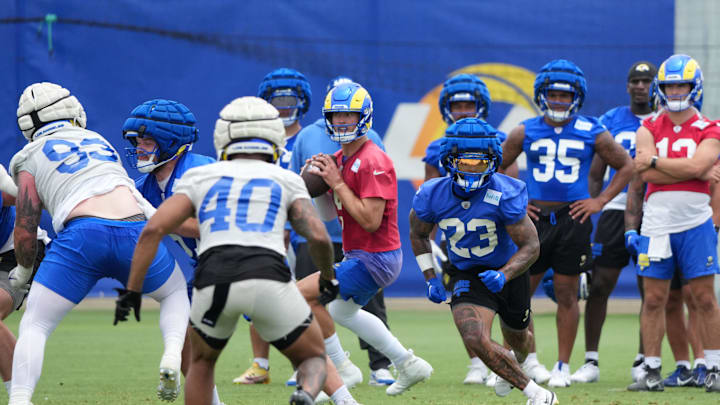 Jun 3, 2025; Woodland Hills, CA, USA; Los Angeles Rams quarterback Matthew Stafford (9) throws the ball during organized team activities at Rams Practice Facility. Mandatory Credit: Kirby Lee-Imagn Images