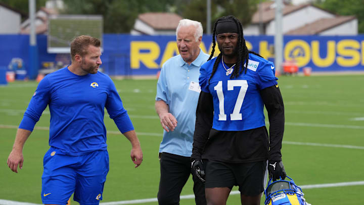 May 28, 2025; Woodland Hills, CA, USA; Los Angeles Rams coach Sean McVay (left) and receiver Davante Adams (17) talks with sports agent Frank Bauer (center) during organized team activities at Rams Practice Facility. Mandatory Credit: Kirby Lee-Imagn Images May 28, 2025; Woodland Hills, CA, USA; Los Angeles Rams coach Sean McVay (left) and receiver Davante Adams (17) talks with sports agent Frank Bauer (center) during organized team activities at Rams Practice Facility. Mandatory Credit: Kirby Lee-Imagn Images