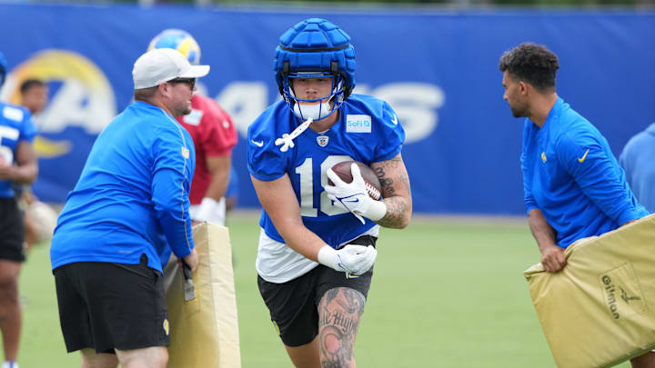 Jun 3, 2025; Woodland Hills, CA, USA; Los Angeles Rams tight end Terrance Ferguson (18) carries the ball during organized team activities at Rams Practice Facility. Mandatory Credit: Kirby Lee-Imagn Images