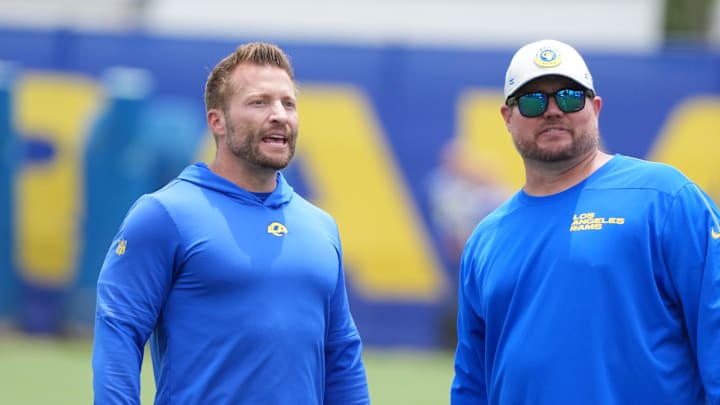 Jun 3, 2025; Woodland Hills, CA, USA; Los Angeles Rams coach Sean McVay (left) and tight ends coach Scott Huff during organized team activities at Rams Practice Facility. Mandatory Credit: Kirby Lee-Imagn Images Jun 3, 2025; Woodland Hills, CA, USA; Los Angeles Rams coach Sean McVay (left) and tight ends coach Scott Huff during organized team activities at Rams Practice Facility. Mandatory Credit: Kirby Lee-Imagn Images