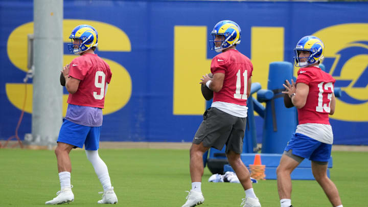 May 28, 2025; Woodland Hills, CA, USA; Los Angeles Rams quarterbacks Matthew Stafford (9), Jimmy Garoppolo (11) and Stetson Bennett (13) throw the ball during organized team activities at Rams Practice Facility. Mandatory Credit: Kirby Lee-Imagn Images May 28, 2025; Woodland Hills, CA, USA; Los Angeles Rams quarterbacks Matthew Stafford (9), Jimmy Garoppolo (11) and Stetson Bennett (13) throw the ball during organized team activities at Rams Practice Facility. Mandatory Credit: Kirby Lee-Imagn Images