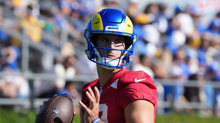 Jul 23, 2025; Los Angeles, CA, USA; Los Angeles Rams quarterback Stetson Bennett (13) throws the ball during training camp at Loyola Marymount University. Mandatory Credit: Kirby Lee-Imagn Images