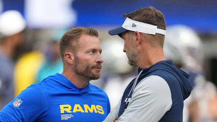 Aug 9, 2025; Inglewood, California, USA; Los Angeles Rams Sean McVay (left) talks with Dallas Cowboys coach Brian Schottenheimer during the game at SoFi Stadium. Mandatory Credit: Kirby Lee-Imagn Images