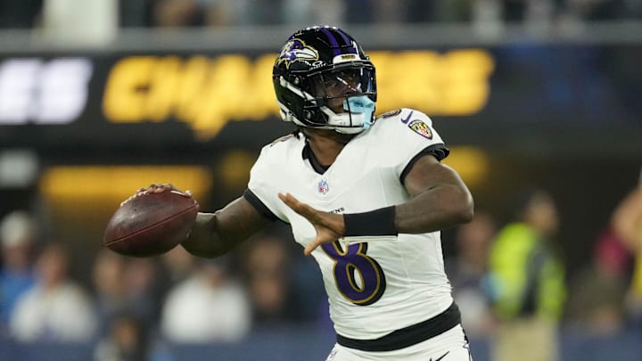 Nov 25, 2024; Inglewood, California, USA; Baltimore Ravens quarterback Lamar Jackson (8) throws the ball against the Los Angeles Chargers in the first half at SoFi Stadium. Nov 25, 2024; Inglewood, California, USA; Baltimore Ravens quarterback Lamar Jackson (8) throws the ball against the Los Angeles Chargers in the first half at SoFi Stadium.