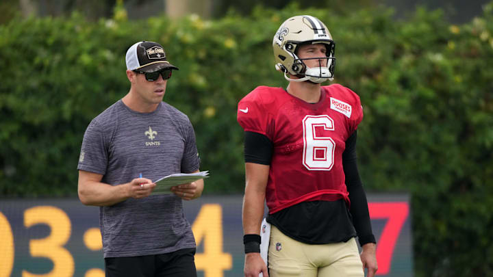 Aug 14, 2025; Carson, CA, USA; New Orleans Saints quarterbacks coach Scott Tolzien (left) and quarterback Tyler Shough (6) during a joint practice against the Los Angeles Rams at the Dignity Health Sports Park. Mandatory Credit: Kirby Lee-Imagn Images Aug 14, 2025; Carson, CA, USA; New Orleans Saints quarterbacks coach Scott Tolzien (left) and quarterback Tyler Shough (6) during a joint practice against the Los Angeles Rams at the Dignity Health Sports Park. Mandatory Credit: Kirby Lee-Imagn Images