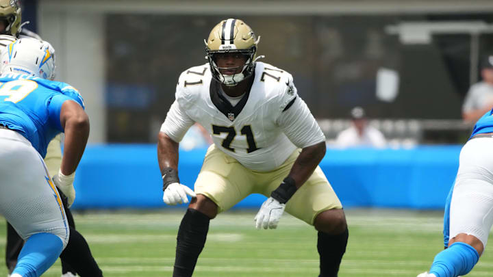 Aug 10, 2025; Inglewood, California, USA; New Orleans Saints offensive tackle Kelvin Banks Jr. (71) against the Los Angeles Chargers in the first half at SoFi Stadium. Mandatory Credit: Kirby Lee-Imagn Images Aug 10, 2025; Inglewood, California, USA; New Orleans Saints offensive tackle Kelvin Banks Jr. (71) against the Los Angeles Chargers in the first half at SoFi Stadium. Mandatory Credit: Kirby Lee-Imagn Images