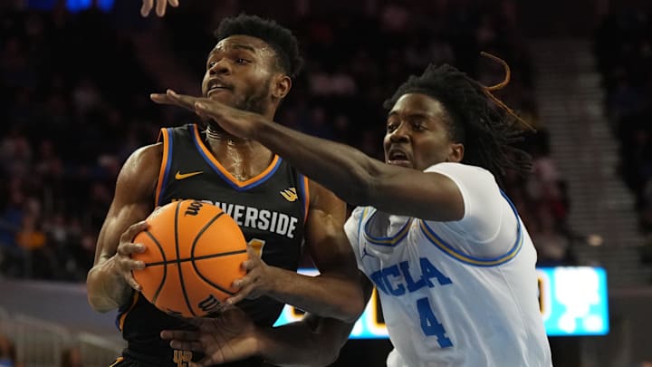 UC Riverside Highlanders guard Barrington Hargress (24) shoots the ball against UCLA Bruins guard Will McClendon (4). 