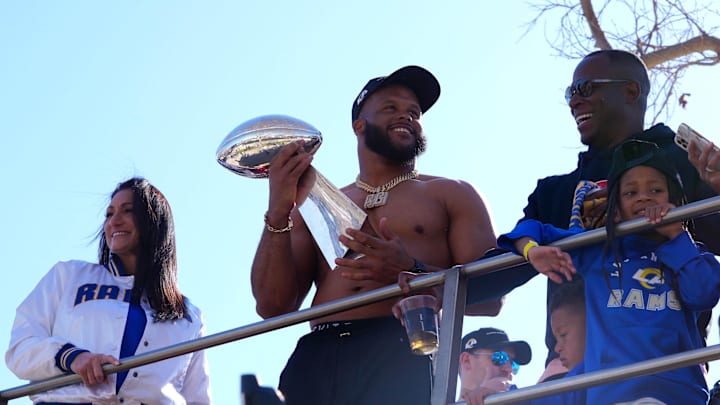 Los Angeles Rams defensive end Aaron Donald holds the Vince Lombardi trophy. Los Angeles Rams defensive end Aaron Donald holds the Vince Lombardi trophy.