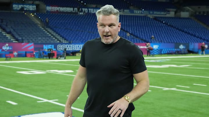 Pat McAfee watches during workouts at the 2025 NFL Scouting Combine at Lucas Oil Stadium.