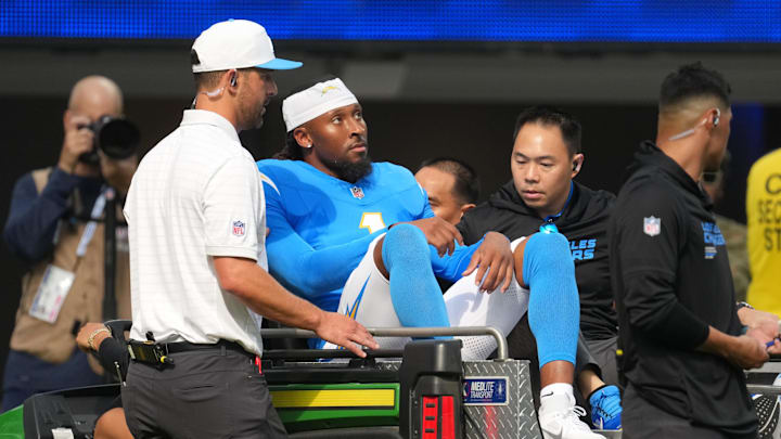 Chargers wide receiver Quentin Johnston was carted off the field after suffering a head injury in Saturday's loss.