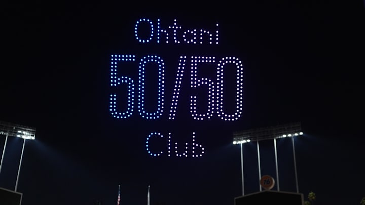 Sep 20, 2024; Los Angeles, California, USA; Los Angeles Dodgers designated hitter Shohei Ohtani is recognized for reaching the 50-50 club during a drone show for achieving 50 home runs and 50 stolen bases in a season at Dodger Stadium. Mandatory Credit: Kirby Lee-Imagn Images