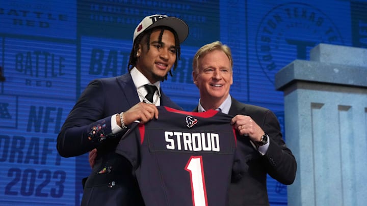 Apr 27, 2023; Kansas City, MO, USA; Ohio State Buckeyes quarterback CJ Stroud (left) poses with NFL commissioner Roger Goodell after being selected as the No. 2 pick  in the first round of the 2023 NFL Draft at Union Station. Mandatory Credit: Kirby Lee-Imagn Images