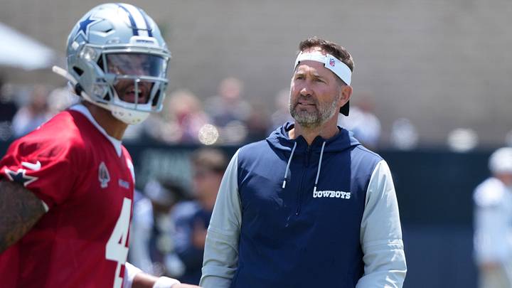 Dallas Cowboys coach Brian Schottenheimer watches quarterback Dak Prescott at training camp at the River Ridge Fields. Dallas Cowboys coach Brian Schottenheimer watches quarterback Dak Prescott at training camp at the River Ridge Fields.
