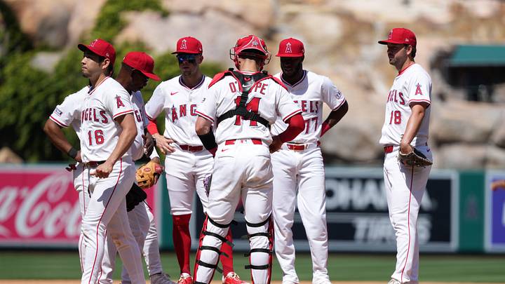 Los Angeles Angels starting pitcher Yusei Kikuchi (16) is removed from the game by manager Ron Washington (37) as catcher Logan O'Hoppe (14), first baseman Nolan Schanuel (18) and second baseman Tim Anderson (77) watch in the sixth inning against the San Francisco Giants at Angel Stadium on April 20, 2025. Los Angeles Angels starting pitcher Yusei Kikuchi (16) is removed from the game by manager Ron Washington (37) as catcher Logan O'Hoppe (14), first baseman Nolan Schanuel (18) and second baseman Tim Anderson (77) watch in the sixth inning against the San Francisco Giants at Angel Stadium on April 20, 2025.
