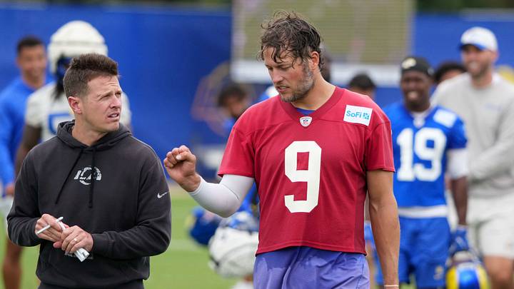 May 28, 2025; Woodland Hills, CA, USA; Los Angeles Rams offensive coordinator Mike LaFleur (left) talks with quarterback Matthew Stafford (9) during organized team activities at Rams Practice Facility. Mandatory Credit: Kirby Lee-Imagn Images May 28, 2025; Woodland Hills, CA, USA; Los Angeles Rams offensive coordinator Mike LaFleur (left) talks with quarterback Matthew Stafford (9) during organized team activities at Rams Practice Facility. Mandatory Credit: Kirby Lee-Imagn Images