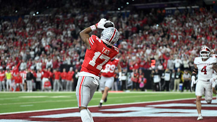 Dec 6, 2025; Indianapolis, IN, USA; Ohio State Buckeyes wide receiver Carnell Tate (17) scores a touchdown against the Indiana Hoosiers in the first quarter during the 2025 Big Ten championship game at Lucas Oil Stadium. Mandatory Credit: Robert Goddin-Imagn Images