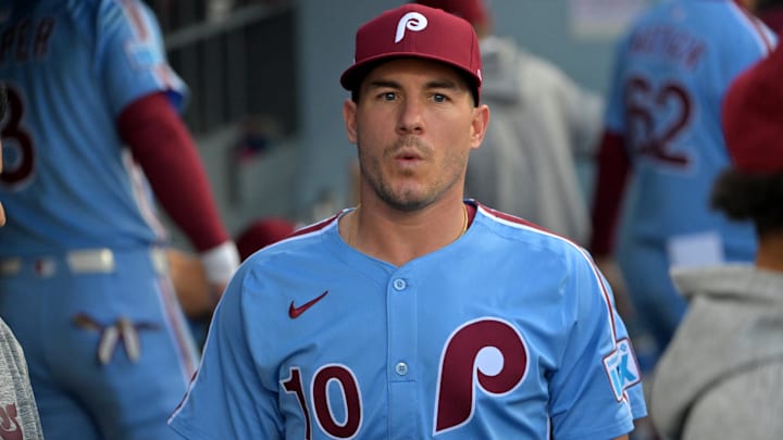 Oct 8, 2025; Los Angeles, California, USA; Philadelphia Phillies catcher J.T. Realmuto (10) in the dugout during game three of the NLDS of the 2025 MLB playoffs against the Los Angeles Dodgers at Dodger Stadium. Oct 8, 2025; Los Angeles, California, USA; Philadelphia Phillies catcher J.T. Realmuto (10) in the dugout during game three of the NLDS of the 2025 MLB playoffs against the Los Angeles Dodgers at Dodger Stadium.
