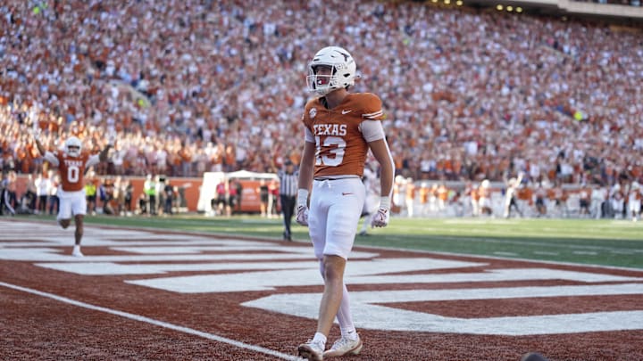 Nov 22, 2025; Austin, Texas, USA; Texas Longhorns wide receiver Parker Livingstone (13) reacts after scoring a touchdown during the first half against the Arkansas Razorbacks at Darrell K Royal-Texas Memorial Stadium. Mandatory Credit: Scott Wachter-Imagn Images