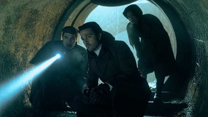 (L-R) Dilan (Théo Costa Marini), Andor (Diego Luna) and Enza Rylanz (Alaïs Lawson) in Lucasfilm's ANDOR Season 2, exclusively on Disney+. ©2024 Lucasfilm Ltd. & TM. All Rights Reserved.