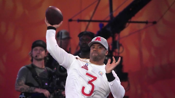 Jan 30, 2025; Orlando, FL, USA; AFC quarterback Russell Wilson of the Pittsburgh Steelers (3) throws the ball during the Passing the Test event at the Pro Bowl Skills Challenge at Nicholson Fieldhouse. Mandatory Credit: Kirby Lee-Imagn Images