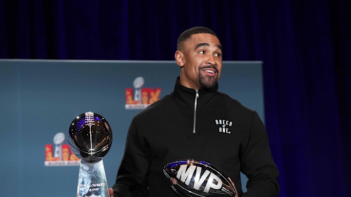 Feb 10, 2025; New Orleans, LA, USA; Philadelphia Eagles quarterback Jalen Hurts (1) poses with the Vince Lombardi trophy at the Super Bowl LIX Winning Head Coach and Most Valuable Player press conference at the Ernest N. Morial Convention Center. Mandatory Credit: Kirby Lee-Imagn Images