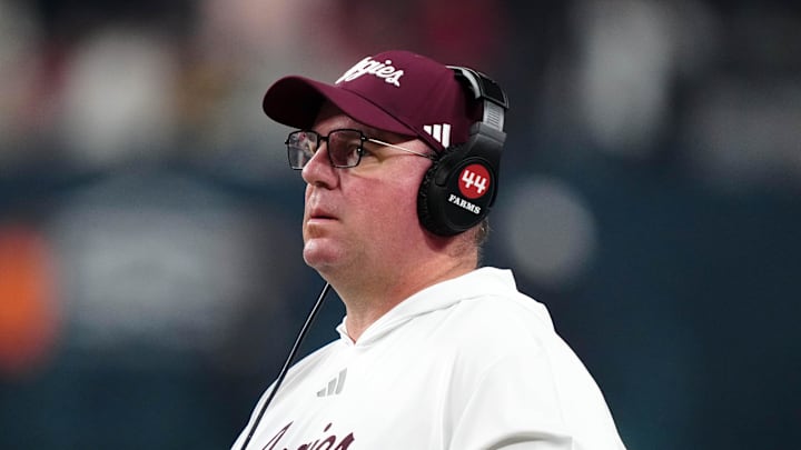 Dec 27, 2024; Las Vegas, NV, USA; Texas A&M Aggies head coach Mike Elko reacts against the Southern California Trojans in the second half at Allegiant Stadium. Mandatory Credit: Kirby Lee-Imagn Images