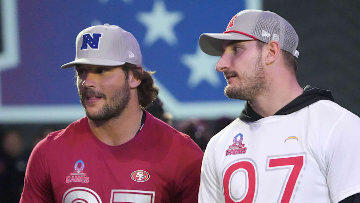 Defensive end Nick Bosa of the San Francisco 49ers (left) with defensive end Joey Bosa of the Los Angeles Chargers (right)