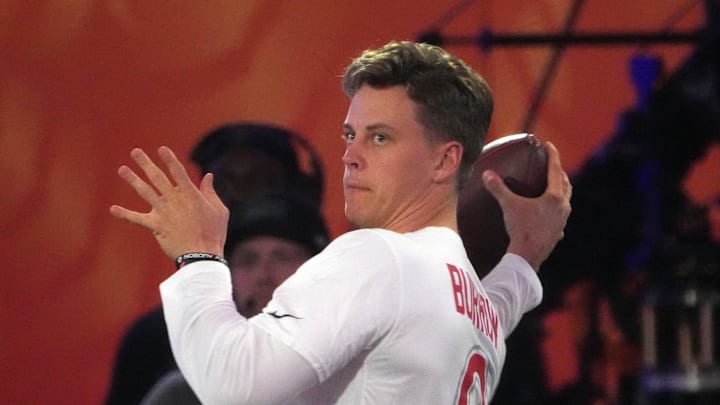 Jan 30, 2025; Orlando, FL, USA; AFC quarterback Joe Burrow of the Cincinnati Bengals throws the ball during the Passing the Test event at the Pro Bowl Skills Challenge at Nicholson Fieldhouse. Mandatory Credit: Kirby Lee-Imagn Images