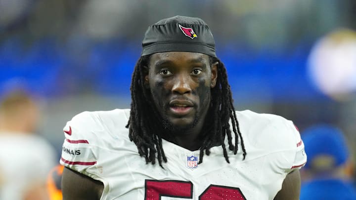 Dec 28, 2024; Inglewood, California, USA; Arizona Cardinals defensive end Darius Robinson (56) reacts against the Los Angeles Rams in the second half at SoFi Stadium. Mandatory Credit: Kirby Lee-Imagn Images